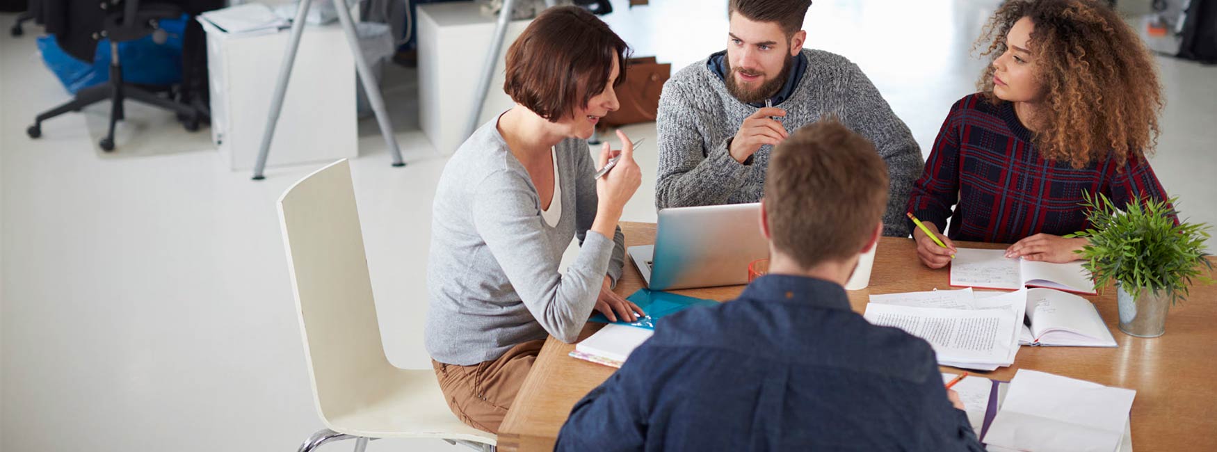 IT Realms team collaborating